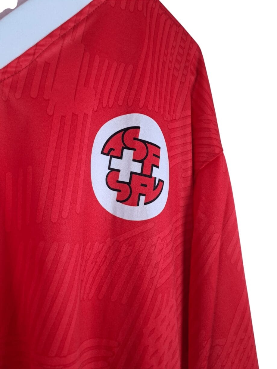 Détail logo 1992-94 – Suisse – Maillot domicile (L) – #9 (KNUP)